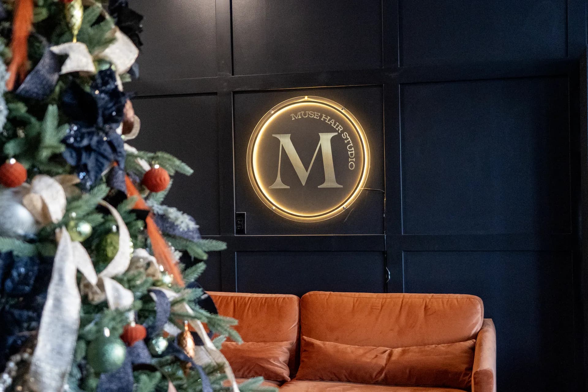 Stylists from Muse Hair Studio sitting together