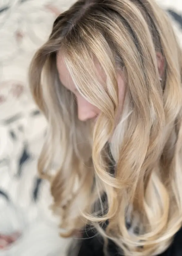 Dimensional blonde balayage at Muse Hair Studio in Powell, Ohio - hand-painted highlights for natural dimension