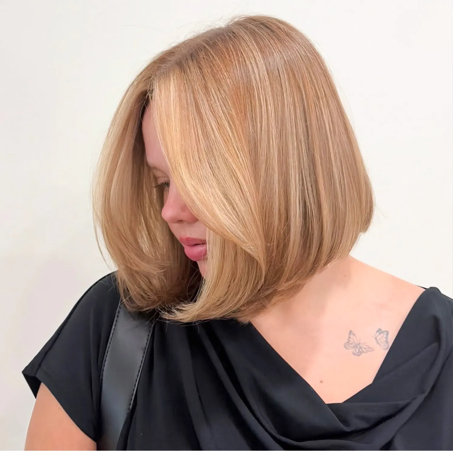 Warm honey blonde lob at Muse Hair Studio in Powell, Ohio